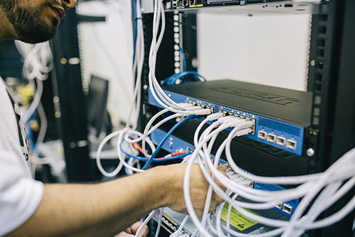 Technician on a server rack